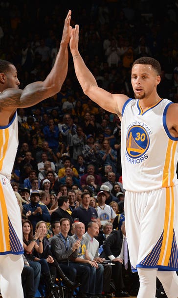 Curry scores 27, Warriors outlast Bulls to reach 14-0